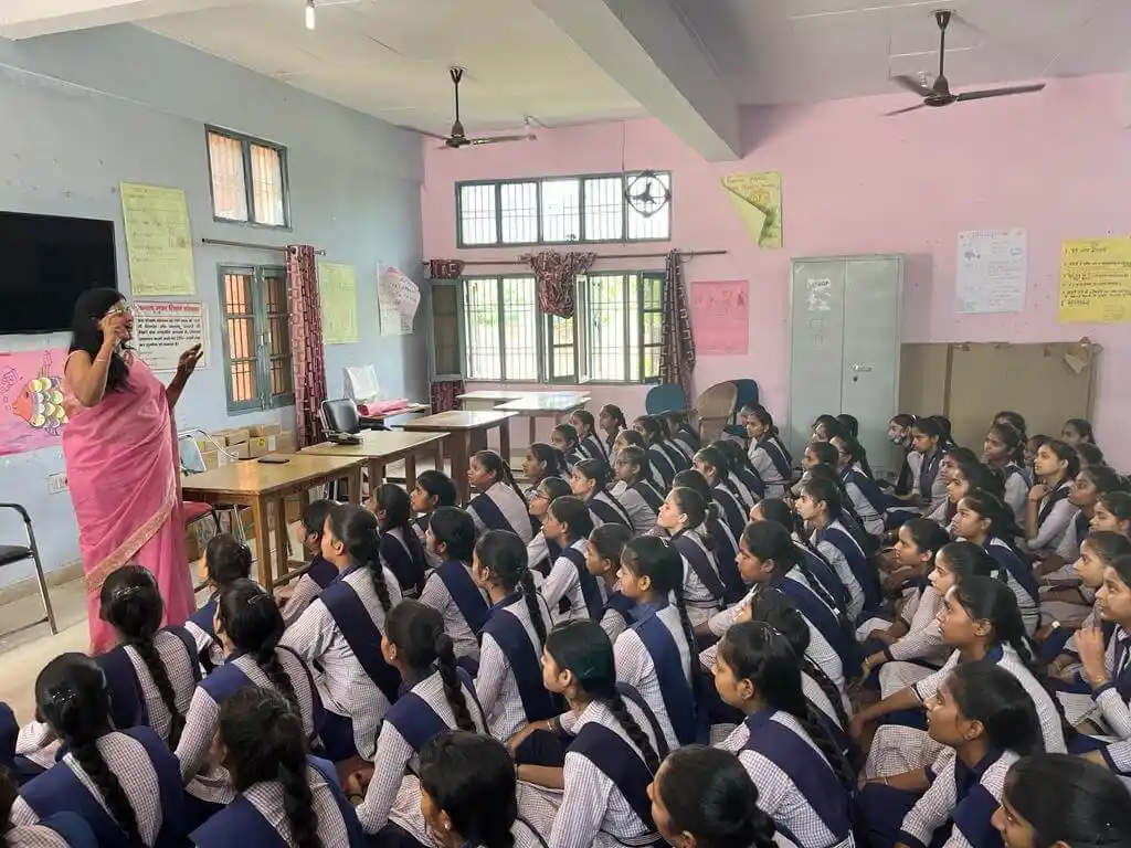 Students presenting startup ideas at a live pitch event